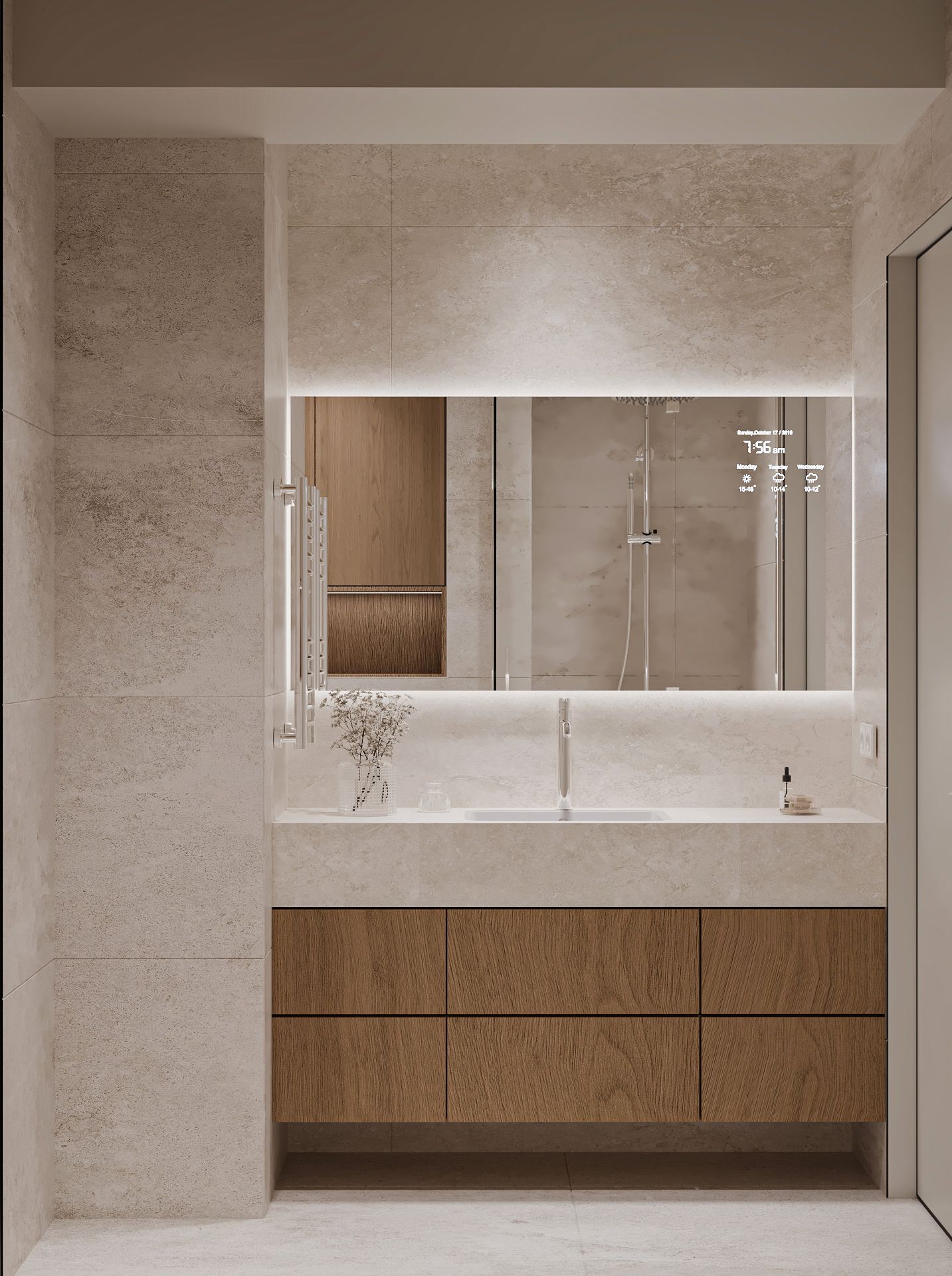 Guest bathroom — a travertine vanity with oak drawers under a wide backlit mirror.